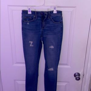 Women’s skinny jeans with slight rips